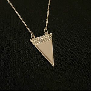 Silver/white triangle necklace.